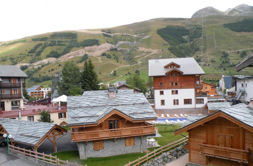 Апартаменты Au Coeur De La Station Ле дез Альп Экстерьер фото